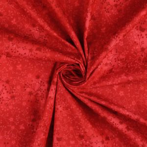 Nahaufnahme: Baumwollstoff Rankenmuster rot, hochwertiger Digitaldruck. Glatte Popeline für Patchwork & Mode – 100% Baumwolle von spitzentraum.ch.