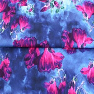 French Terry Stoff mit Blumenmuster in jeansblau und fuchsia