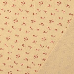 Detailansicht Jaquard Musselin hellbeige: Stoff mit floralem Digitaldruck und strukturierter Rückseite, ideal für dekorative Krempelsäume an Blusen und Hosen.