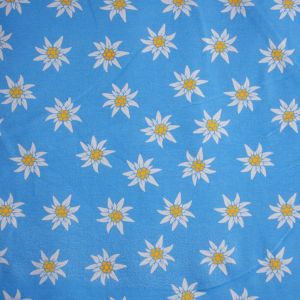Jersey Stoff mit Edelweiss Muster in hellblau