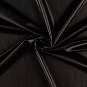 Bielastisches, leicht glänzendes Kunstleder Farbe schwarz. Flexibles Material, ideal für figurbetonte Mode wie Kleider und Overalls.