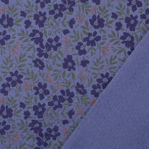 Detailansicht Jaquard Musselin: Blaue Webware mit Blumenmuster und strukturierter Rückseite in Stepp-Optik, blickdicht und weich für Kleider und Hosen.