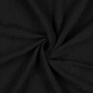 Detailaufnahme eines schwarzen Musselin Stoffes mit Ton-in-Ton Blumenstickerei. Die mittelgrossen Blüten heben sich dezent vom gewebten Hintergrund ab.