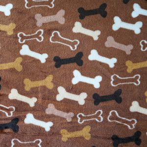 Plüsch Stoff mit Hundeknochen-Muster in braun-beige