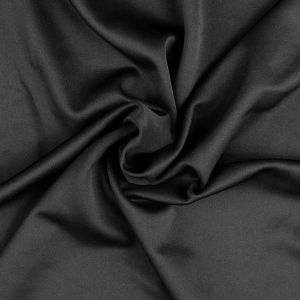 Hochwertiger Scuba Stoff in der Farbe schwarz mit weicher Oberfläche und dezentem Glanz. Ideal für Kleidung und kreative Projekte.