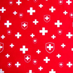 Dünner, roter Baumwollstoff mit weissem Schweizer Kreuz-Muster, perfekt für Bekleidung und Dekorationen im Schweizer Stil.