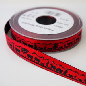 Rolle des 25mm Webbandes in rot mit schwarzem Scherenschnitt-Muster. Hochwertiges, robustes Band für DIY und Trachten-Projekte.